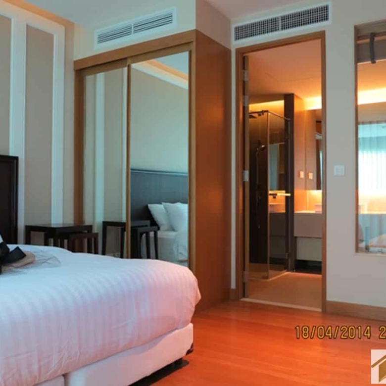 Spacious bedroom with elegant design features