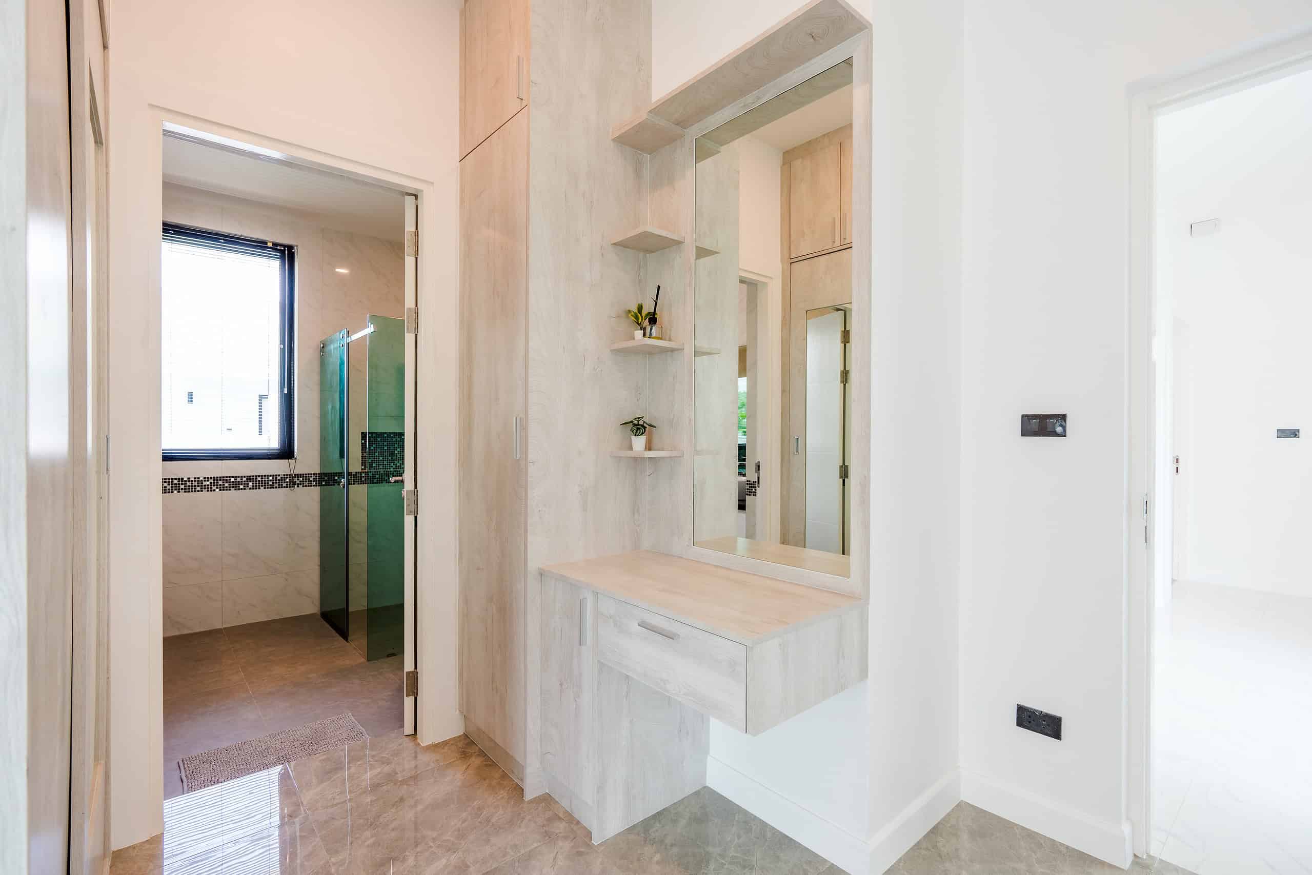 Luxurious bathroom featuring soaking tub and separate shower