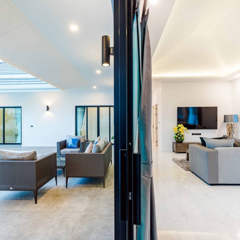 Spacious master suite with sitting area and storage