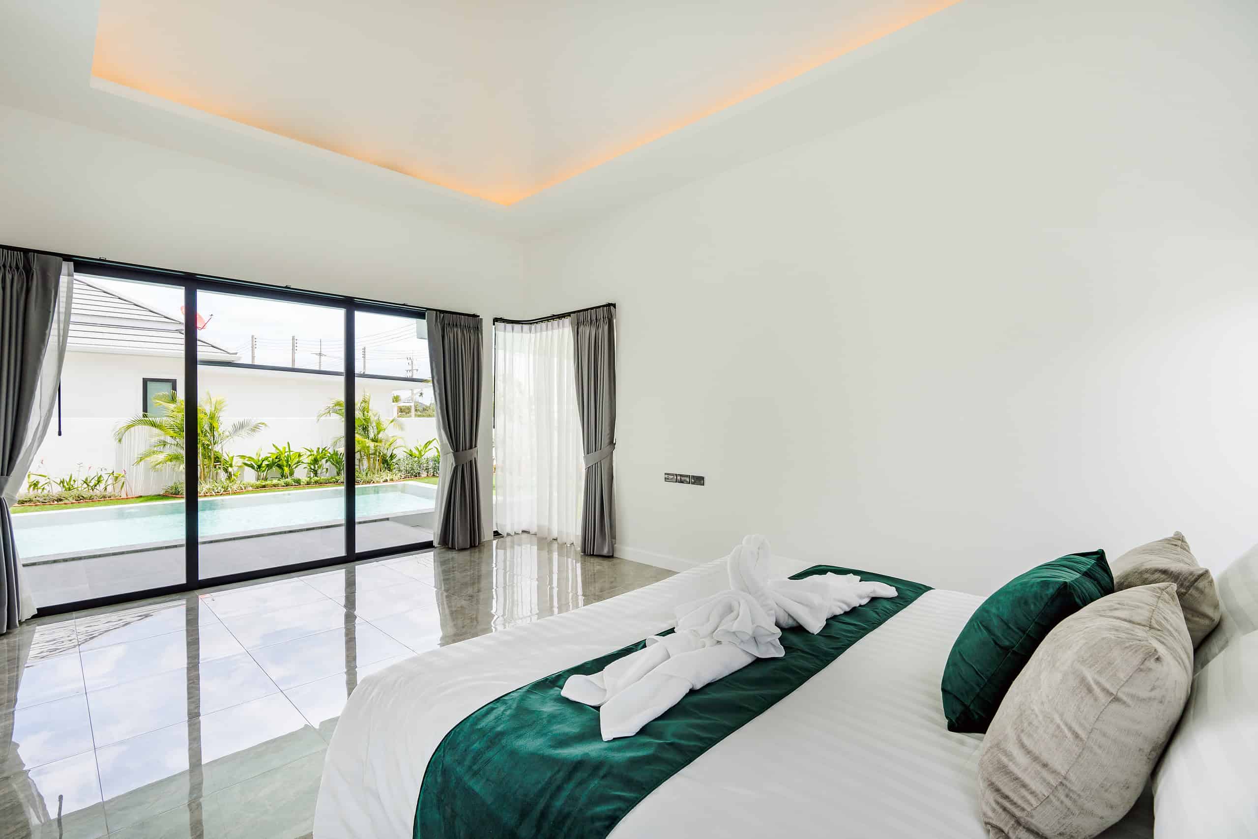 Exquisite Villa with Outdoor Pool Stunning property entrance with welcoming curb appeal