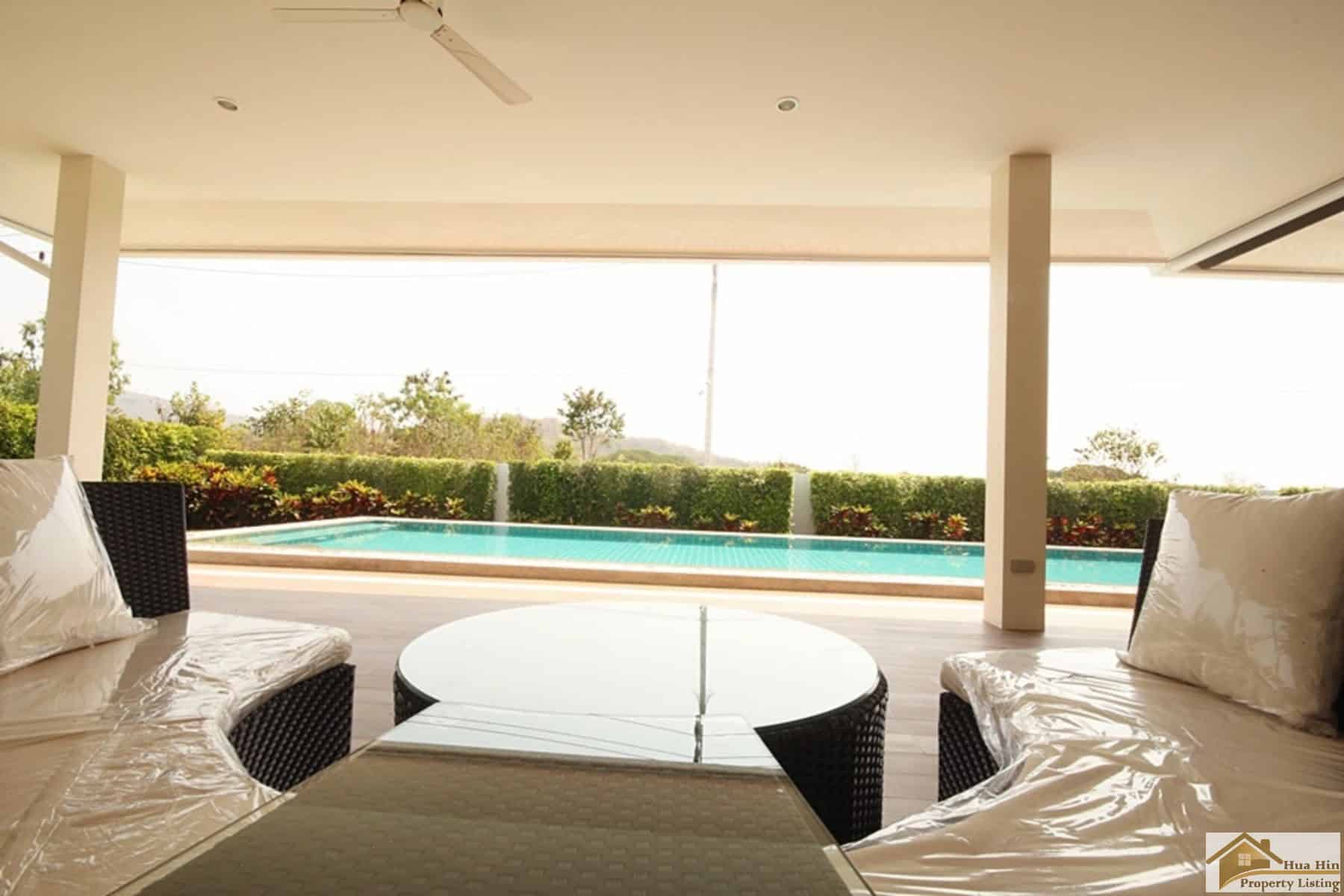 Luxury Hua Hin Property For Sale Living Area Evening Light Villa Emerald Valley