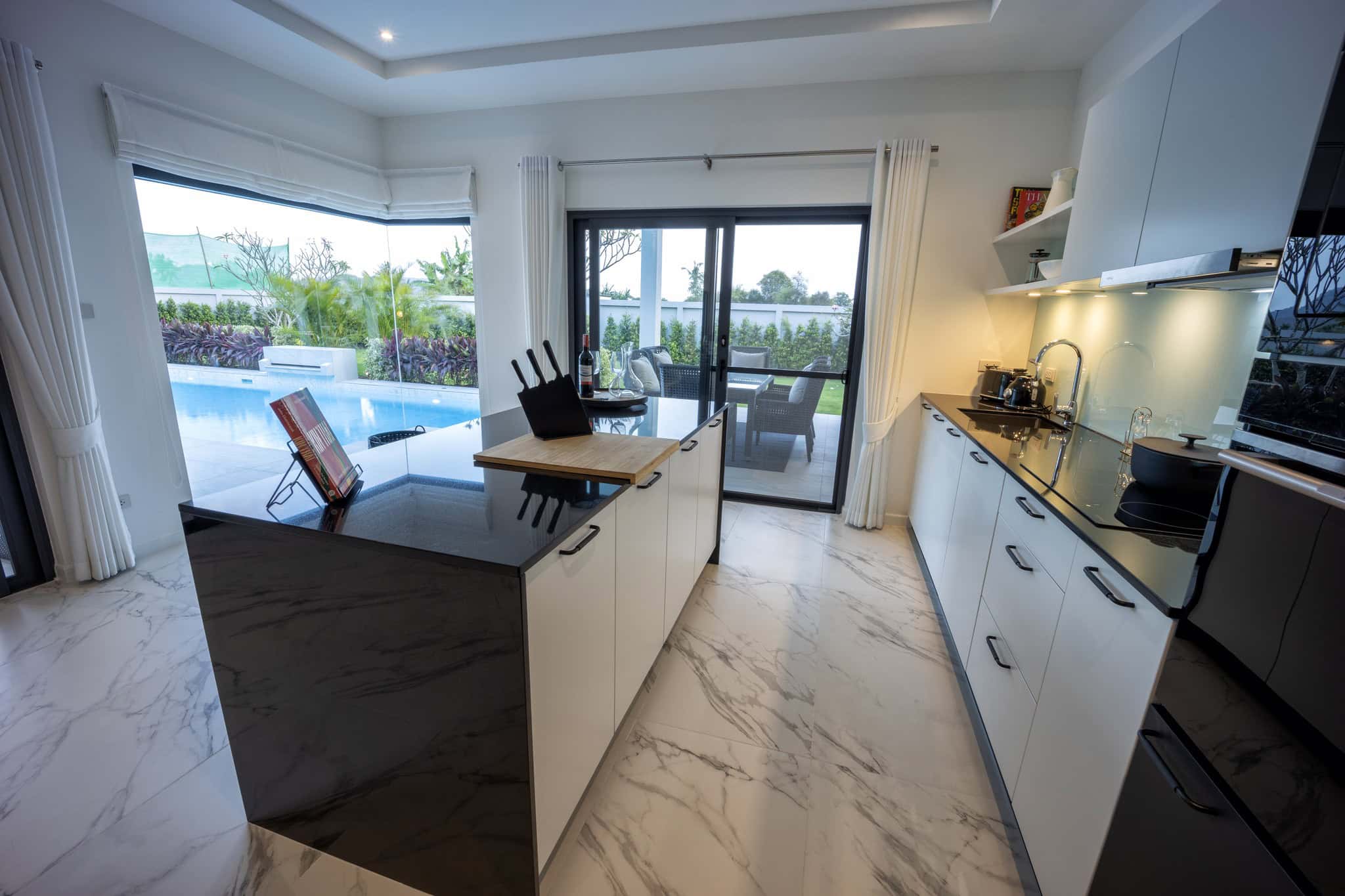Stylish villa kitchen island for entertaining guests