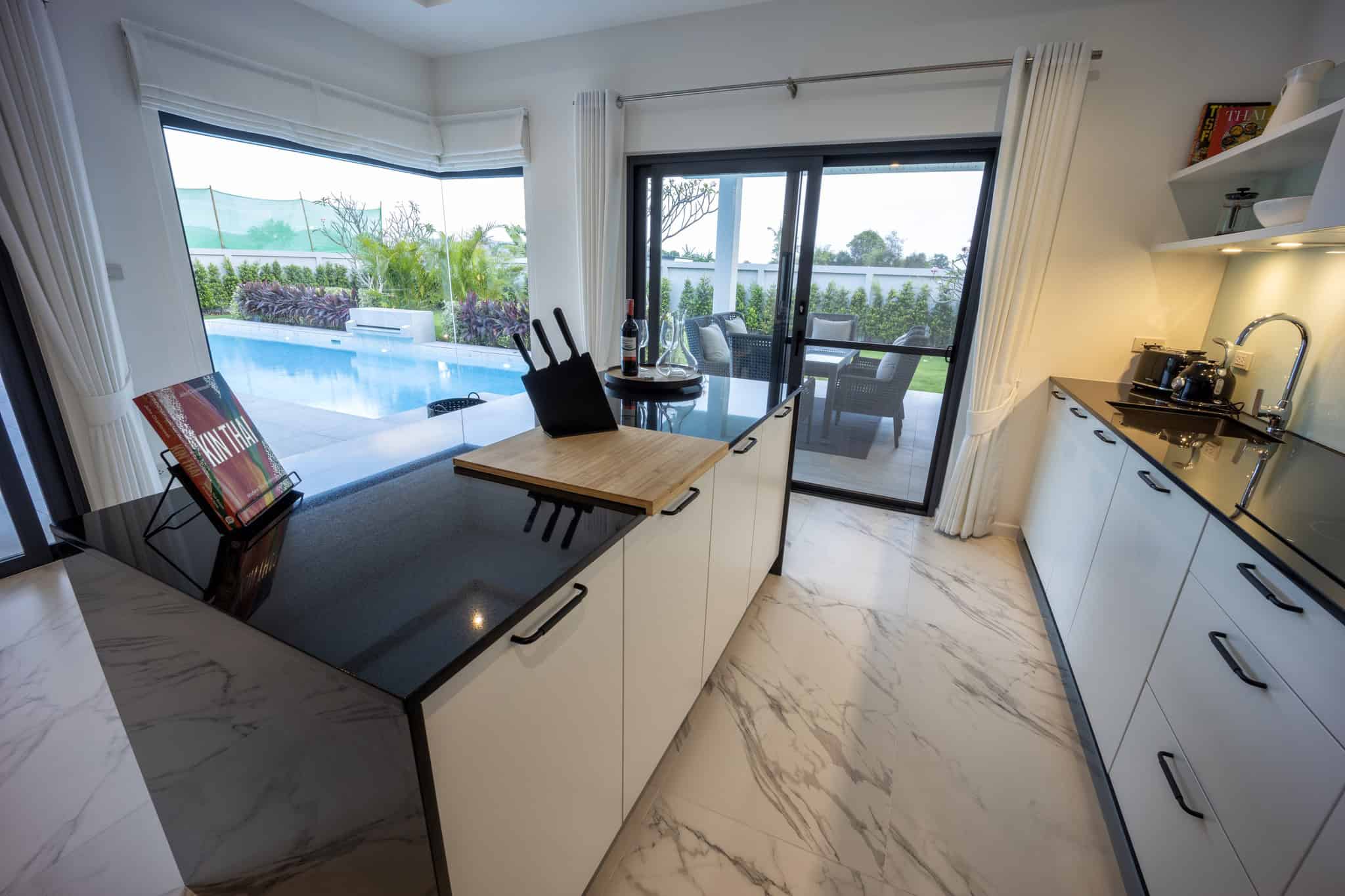 Premium Villa Features Elegant dining room perfect for family gatherings