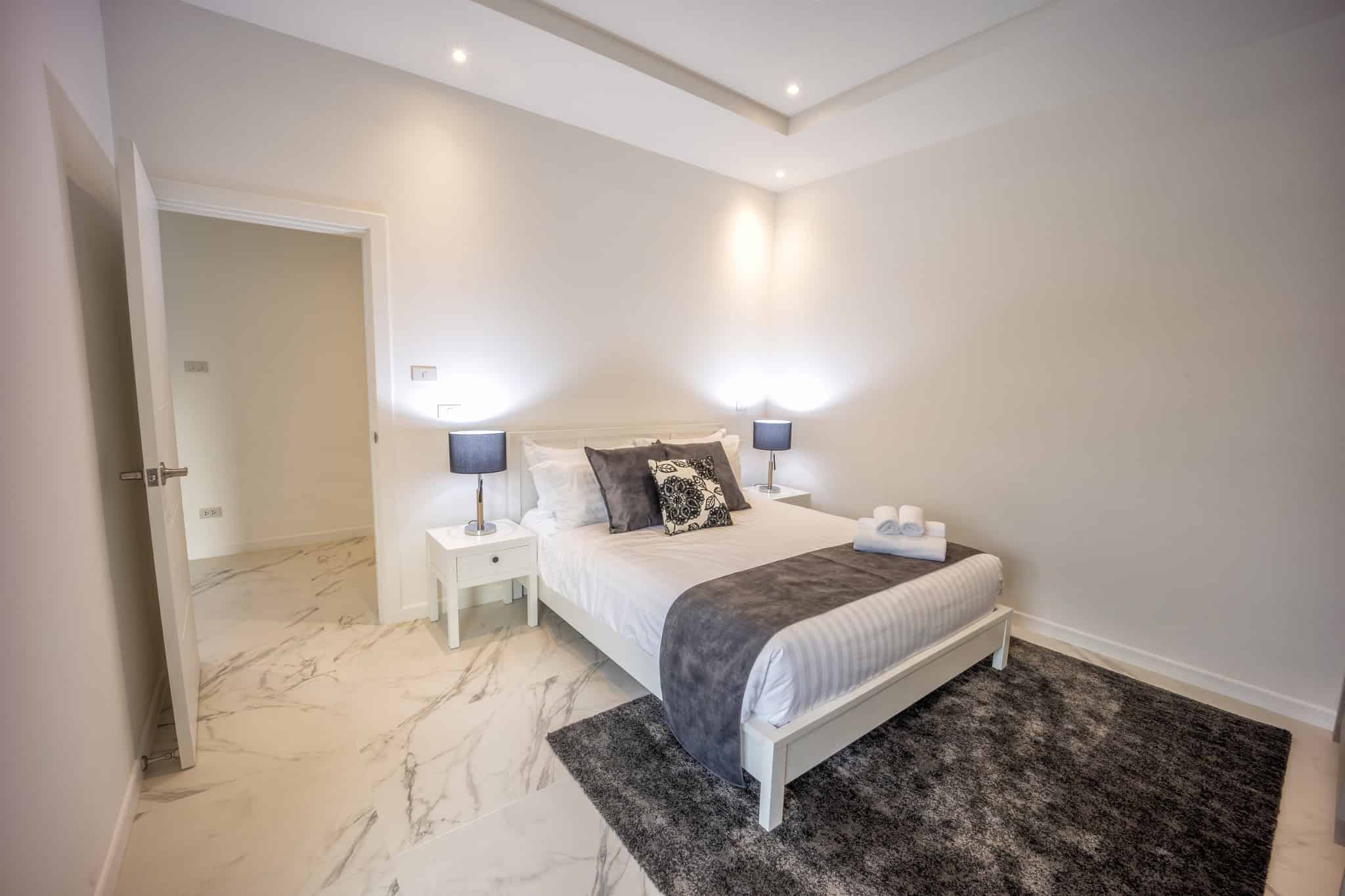 Upscale Villa Property Villa living area with high ceilings and windows