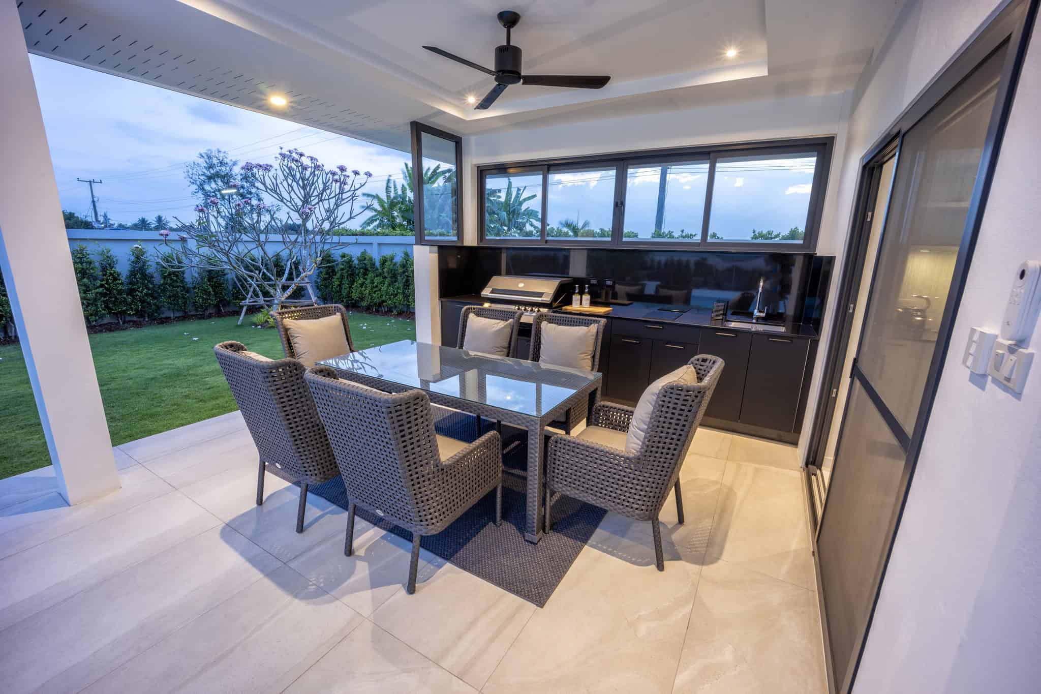 Exclusive Residential Villa Outdoor terrace dining area overlooking gardens