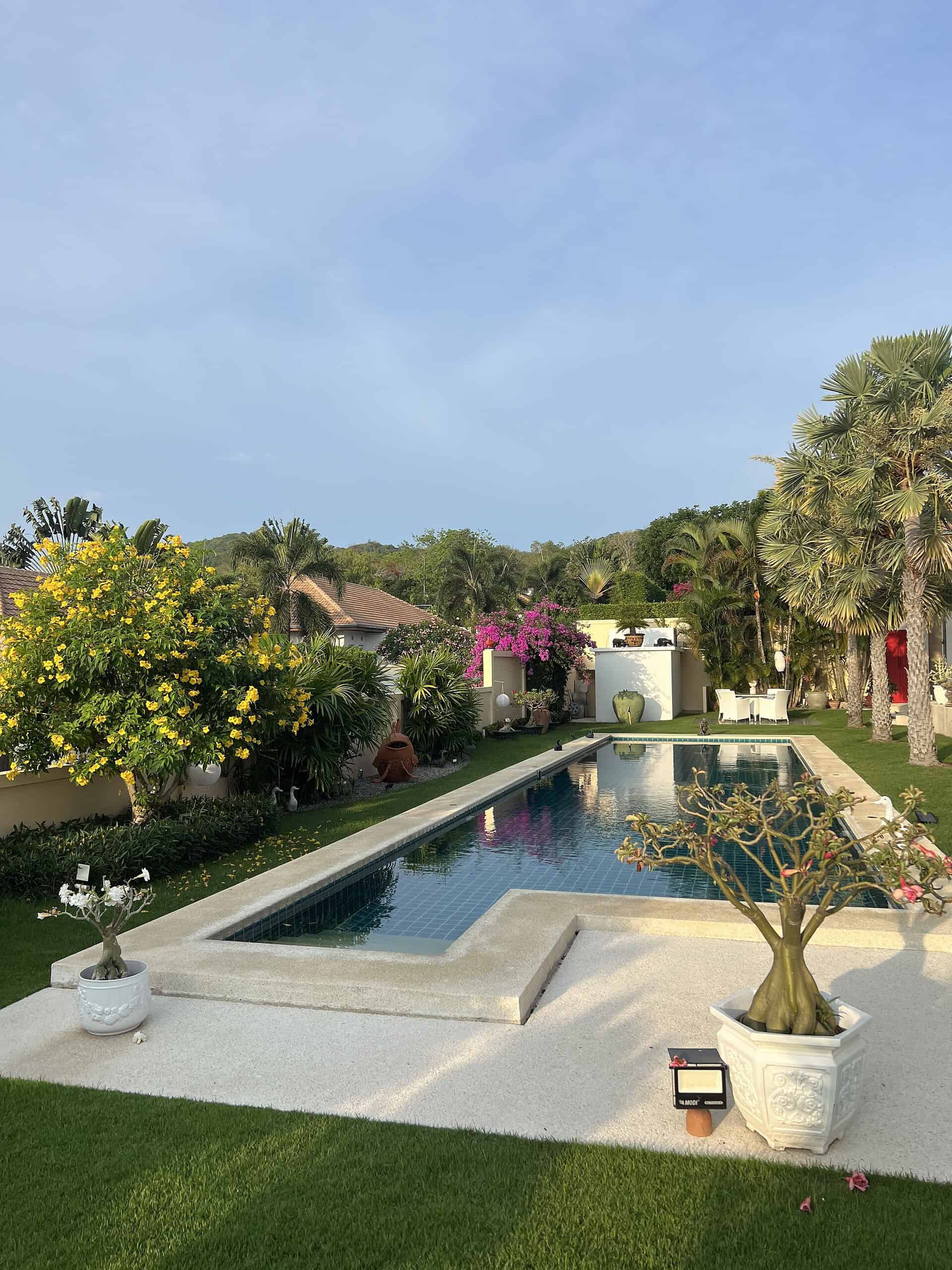 Relaxing Home with Inviting Pool Area Contemporary living spacious pool villa